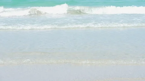 Wave sea slow motion on sand of beach on summer season Video stock 237388383