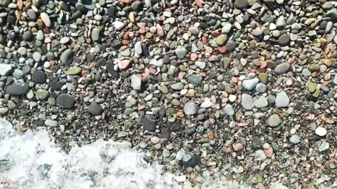 A wave on the sea with stone. Stock Footage 235369543