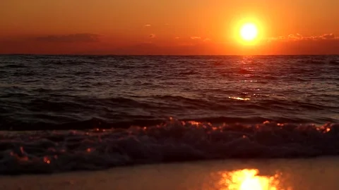 Wave of the sea in the sunset. Stock Footage