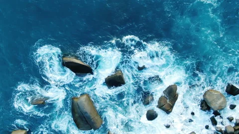 Wave sea turquoise rolling slow crash rocks coastline summer. Stock Footage 208611299