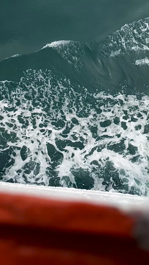 Wave of seawater from the sailing ship Stock Footage 310549213