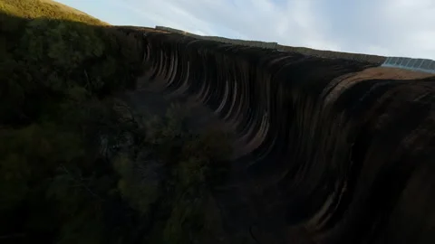 Wave shaped rock in Australia Stock Footage 244635307