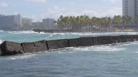 Wave slaming into protective barrier Stock Footage 59569860