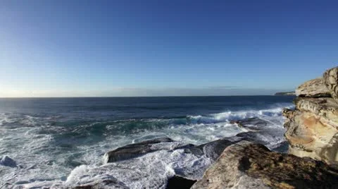 Wave splash against rocks Stock Footage 11302557