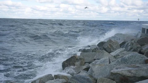 Wave splash at the pier on a stormy day Stock Footage 69754053