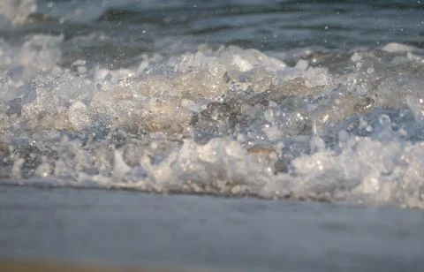 Wave splash sea beach macro Stock Photos