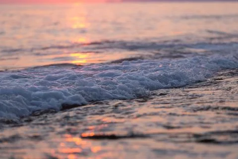 Wave splash at sunset Foto stock