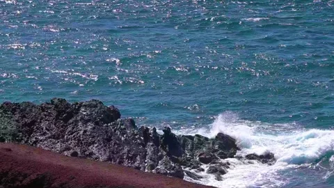 Wave splash on volcanic rock. Canary Islands, Lanzarote. HD Stock Footage 168346357