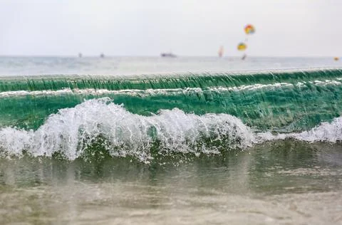Wave with splashes Stock Photos