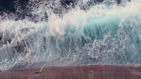Wave splashing against the board of the cargo vessel. Stock Footage 138748859