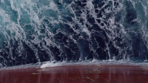 Wave splashing against the board of the cargo vessel. Stock Footage 139398751