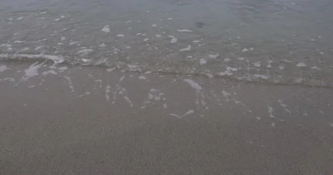Wave splashing over seabeach Stock Footage 204140853