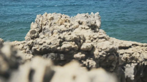 Wave splasing about stones on mediterranean sea. 4K Stock Footage 92992986