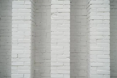 Wave style brick wall texture, white bricks surface Stock Photos
