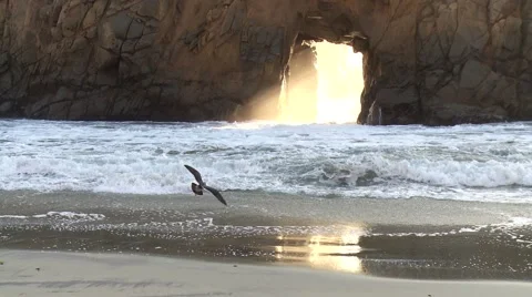 Wave surges through cave Stock Footage 43222022