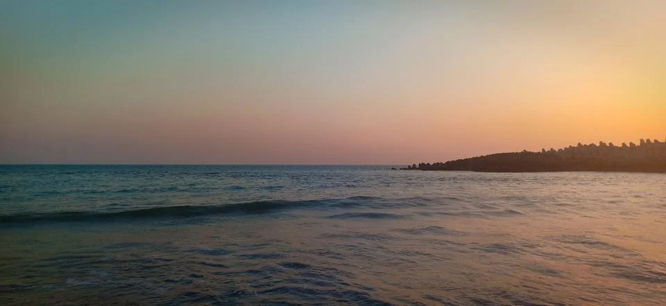 Wave at the time of sunset Stock Photos
