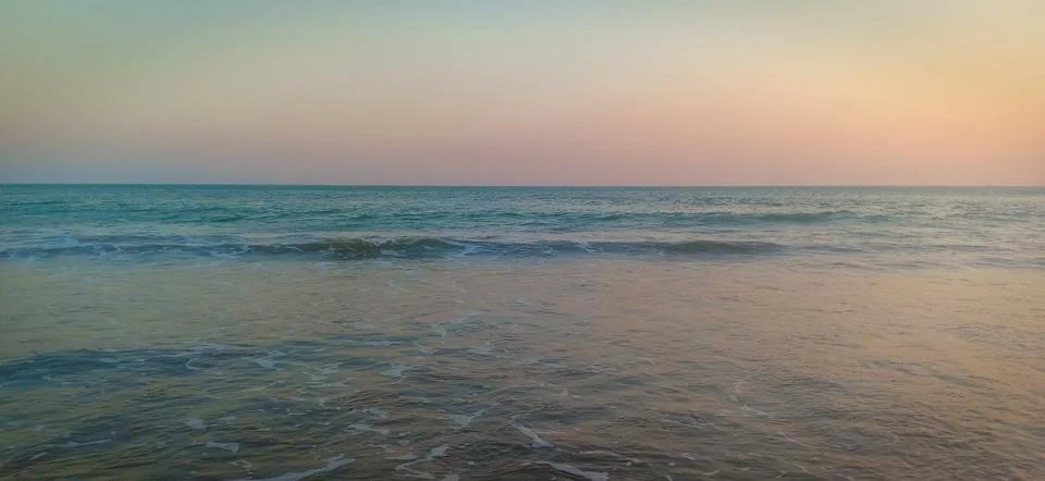 Wave at the time of sunset Stock Photos