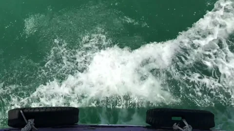Wave top view on the boat, green sea travel and holiday concept Stock Footage 99911027