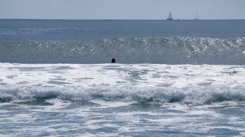 Wave washes over bodyboarder Stock Footage 93722811