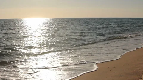 Wave by wave on sandy coast Stock-Footage 111770157