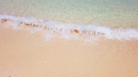 Wave on white sand beach Stock Footage 109040729