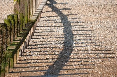 Wavebreak shadows Stock Photos