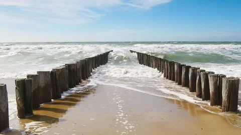 Wavebreaker on the sea, 4k Stock Footage 79695446
