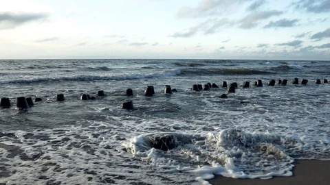 Wavebreakers on Baltic Sea coast 400% slow motion Stock Footage 92080281