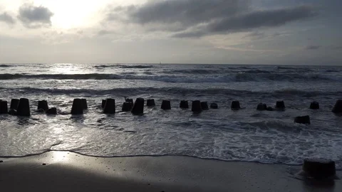 Wavebreakers on Baltic Sea coast, evening Stock Footage 92078169