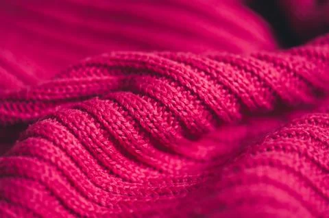Waved knitted textile with parallel pattern braids closeup. Winter season. Se Stock Photos