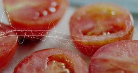 Waveform appearing and sliding across tomato halves as lens pulling focus, Stock Footage 328347646