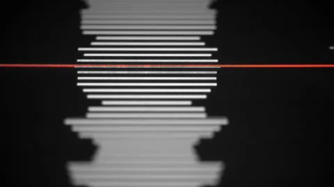 Waveforms of audio editor with red line following the audio recording as it p Stock-Footage 236911007