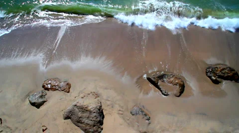 Waves 01: rocky beach overhead Stock Footage 885953