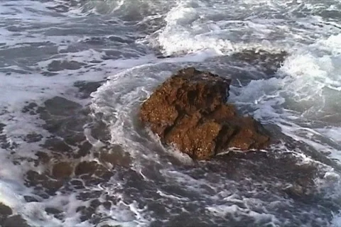 Waves against rocks Stock Footage 111170