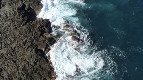 Waves against rocks Video stock 84127515