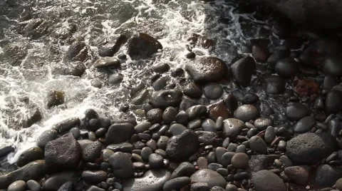 Waves against rocks in Hawaii Video stock 45673763