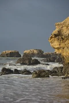 Waves against Rocks Stock Photos