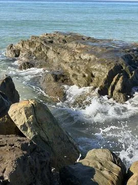 Waves among the Rocks Stock Photos
