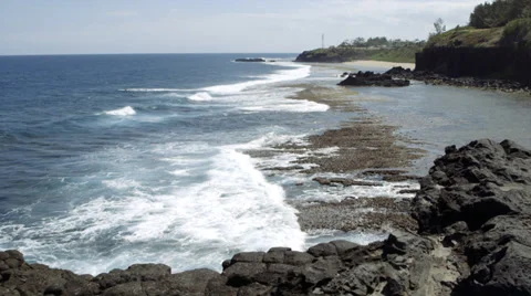 Waves and Basalt Cliff Stock Footage 32153526