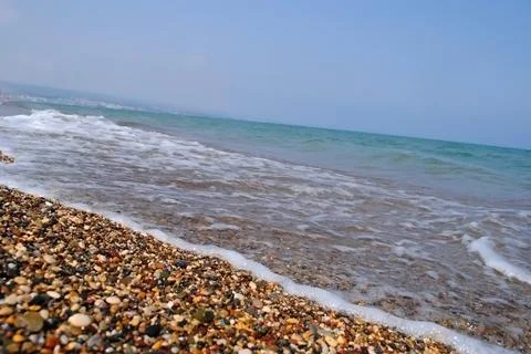 Waves and beach on the beach. Stock Photos