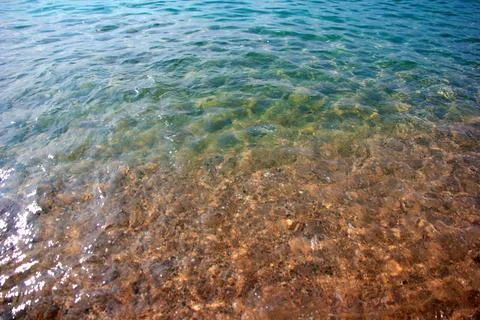 Waves and beach Stock Photos