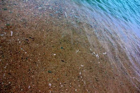 Waves and beach Stock Photos