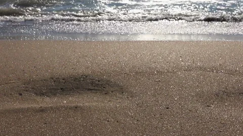 Waves and beach sand Stock Footage 41421792