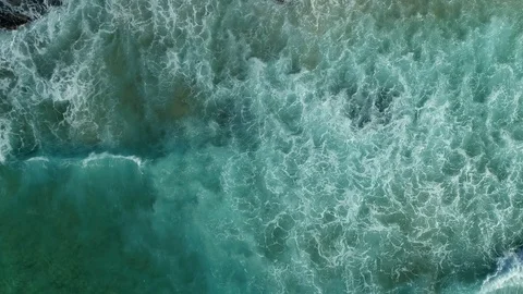 Waves and broken water from overhead Stock Footage 107066621