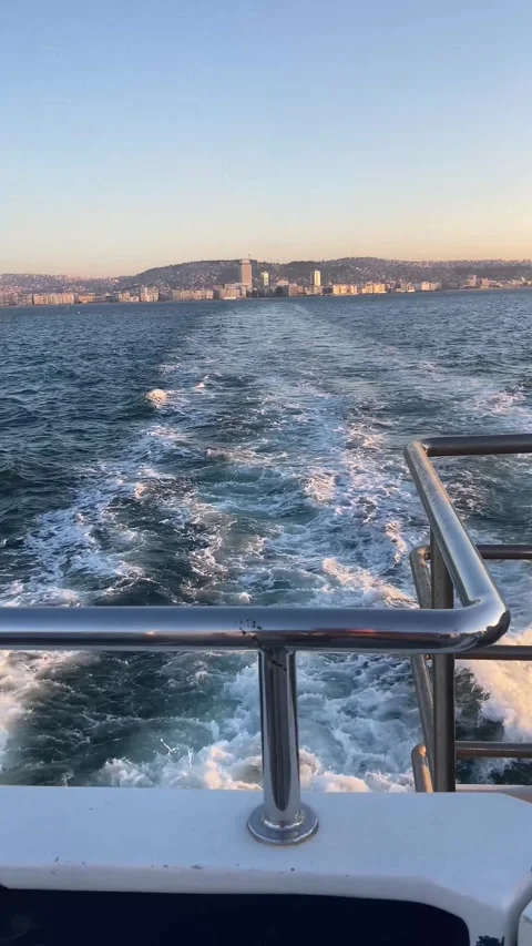 Waves and the City in Daylight (Vertical) Stock Footage 295209564