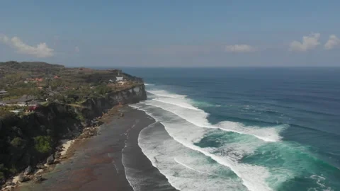 Waves and cliffs in Bali Stock Footage 260284461