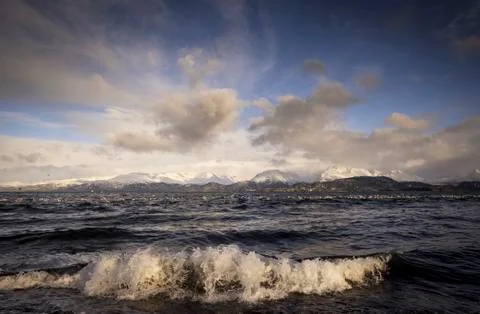 Waves and clouds Stock Photos