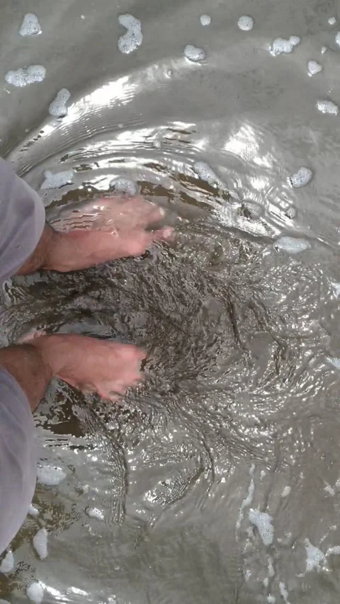 Waves and feet Stock Footage 240500241