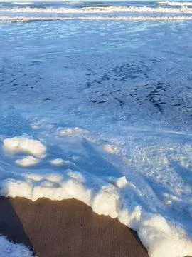 Waves and foam on the coast of the Atlantic Ocean Argentina Stock Photos