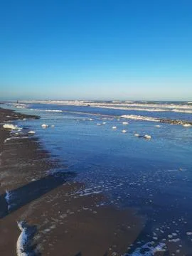 Waves and foam on the coast of the Atlantic Ocean Argentina Stock Photos